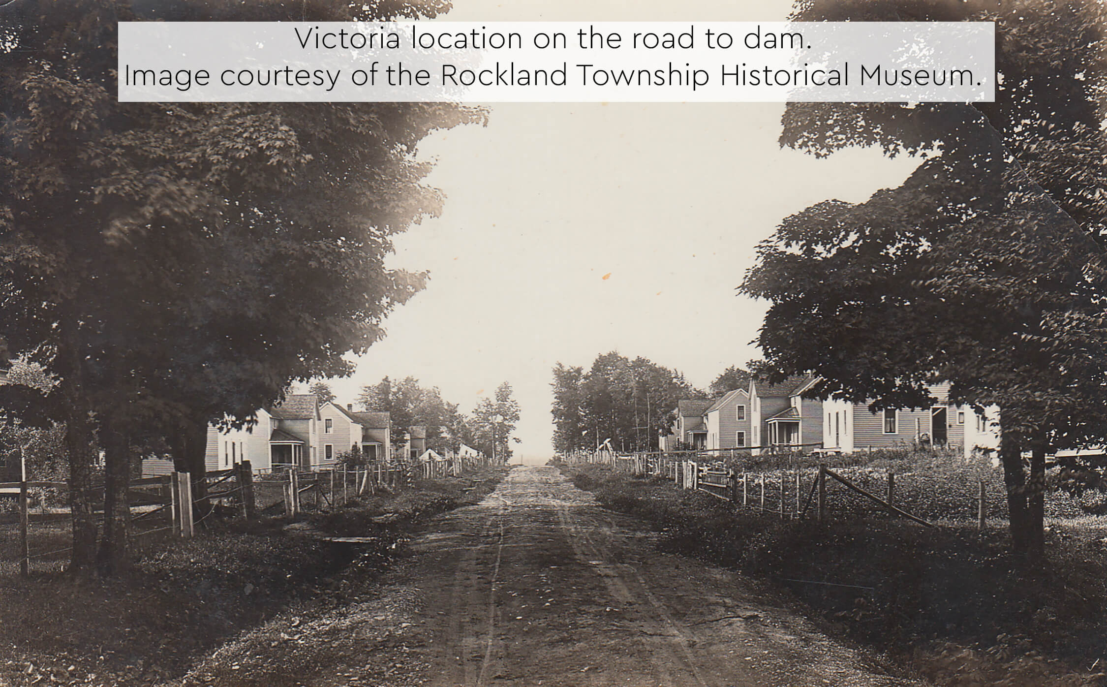 Black and white photo of Victoria Mine, showing mine buildings and horse-drawn wagon.